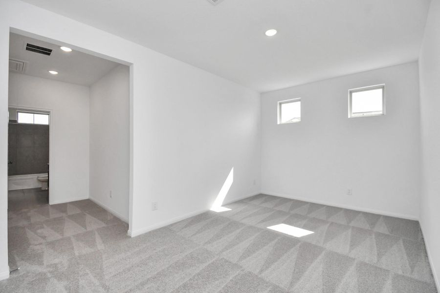 Spacious, unfurnished interior of a new home in 50' Traditional Homes at Elyson, Katy (Image 33).