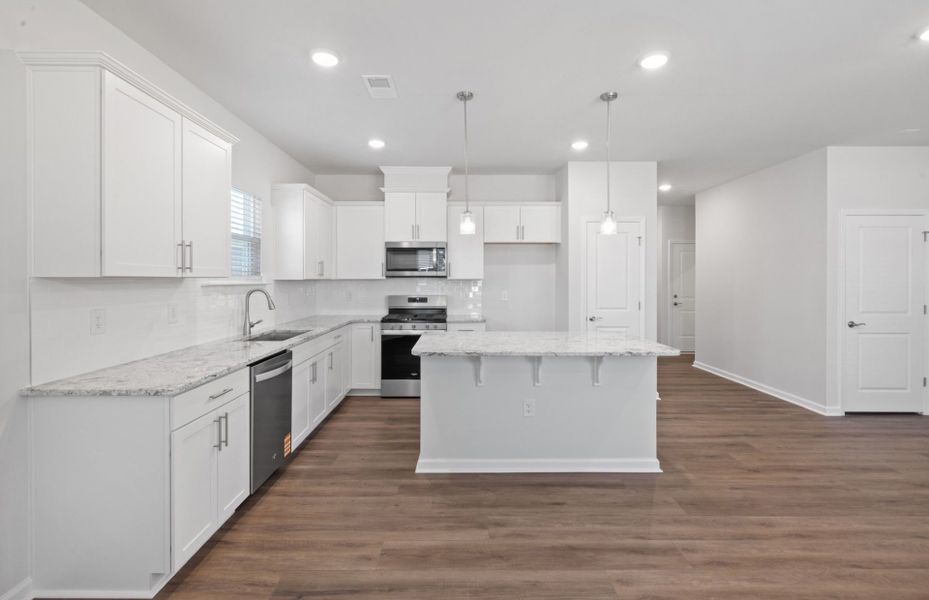 Furnished interior view inside a new home in Exchange at 401, Raleigh (Image 12).