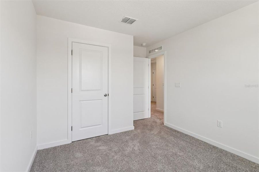 Spacious, unfurnished interior of a new home in Cyrene at Harmony, St. Cloud (Image 29).