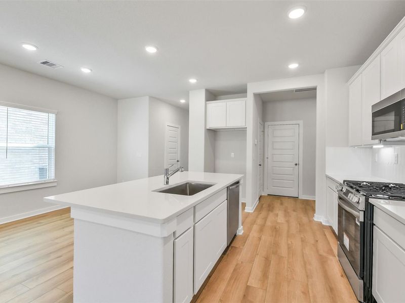 Furnished interior view inside a new home in Lakes at Black Oak, Magnolia (Image 5).
