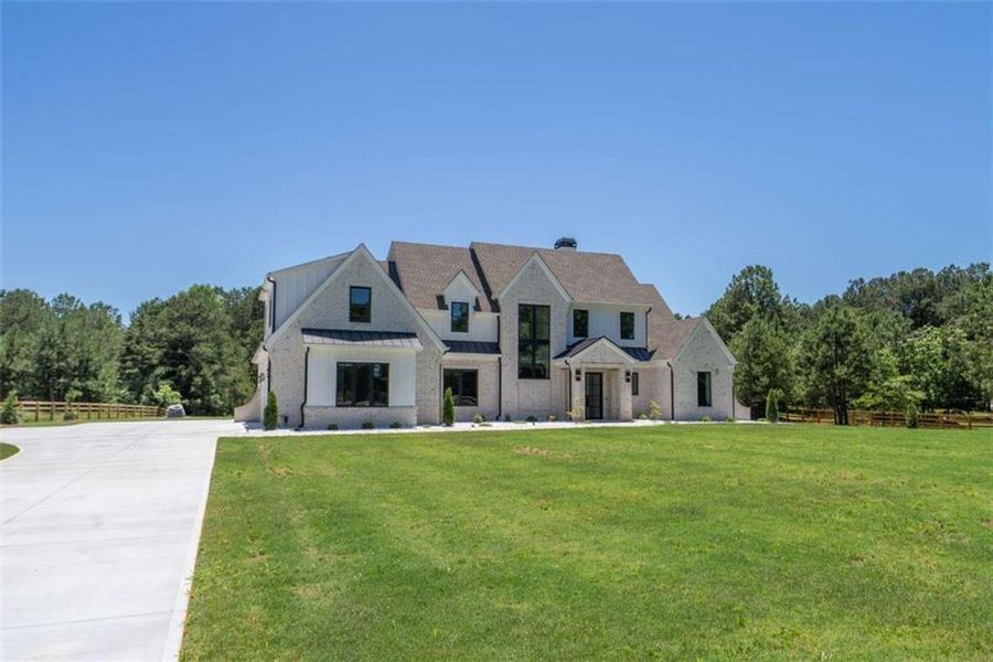 Front exterior of a new home in , Monroe, GA, highlighting curb appeal (Image 28).