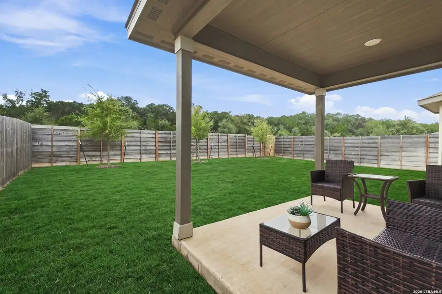 Exterior details and patio area of a home in Fox Falls, Boerne (Image 4).