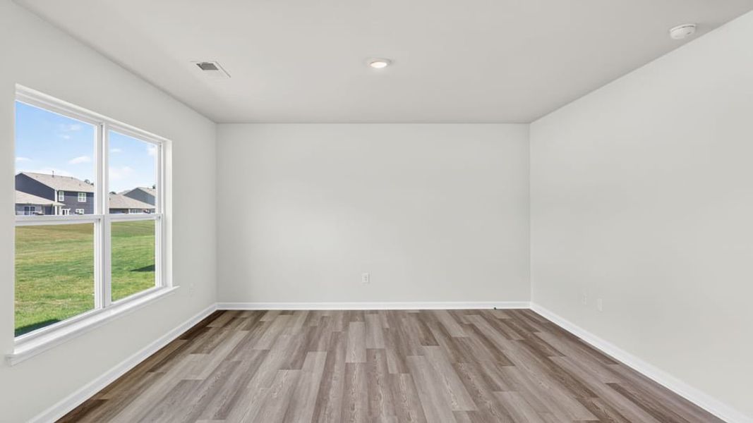 Spacious, unfurnished interior of a new home in Bentley Park, Greenwood (Image 22).