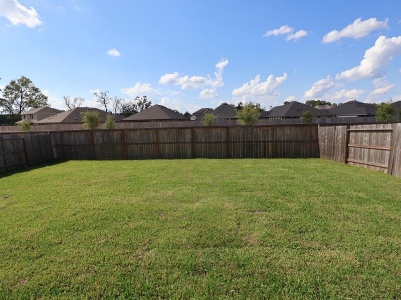 Exterior details and patio area of a home in Moran Ranch, Willis (Image 15). Exterior details and patio area of a home in Moran Ranch, Willis (Image 15).