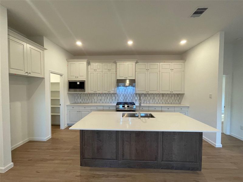 **Photos are a representation of the floor plan. This is not the actual homesite.**