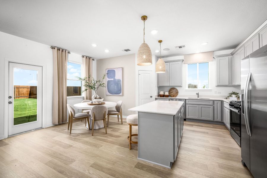 Representative furnished interior of a home built from the Sandalwood by Pulte Homes in Woodside, Georgetown (Image 9).