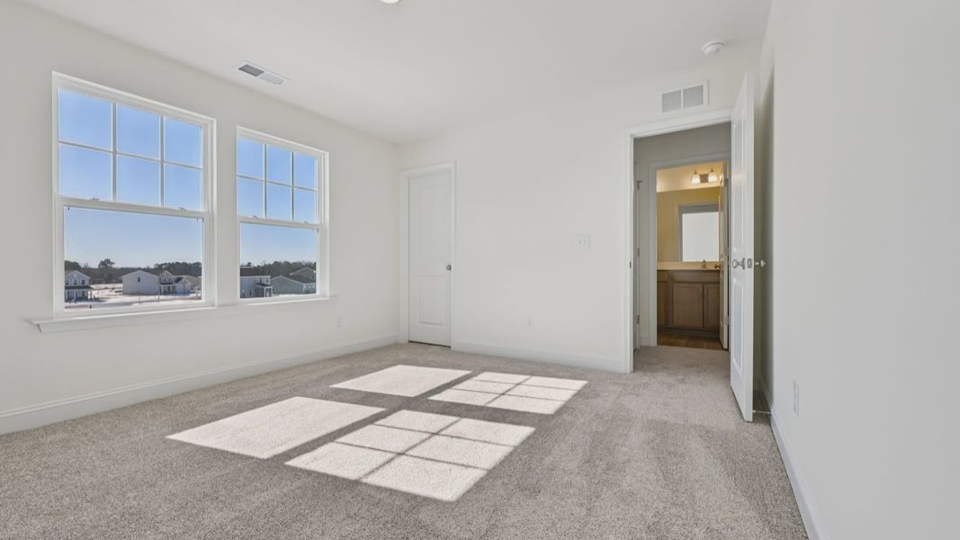 Furnished interior view inside a new home in Sidney Creek Single Family, Zebulon (Image 41).