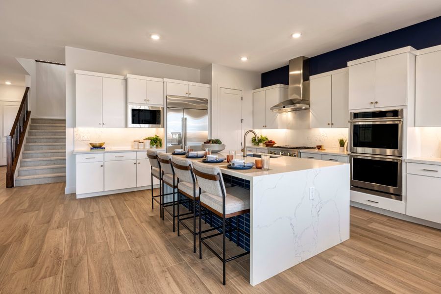 Representative furnished interior of a home built from the Tipton Plan 3507 by Tri Pointe Homes in Waterston Central, Gilbert (Image 8).
