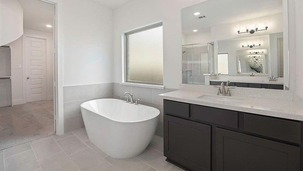 Furnished interior view inside a new home in The Trails, New Caney (Image 12).