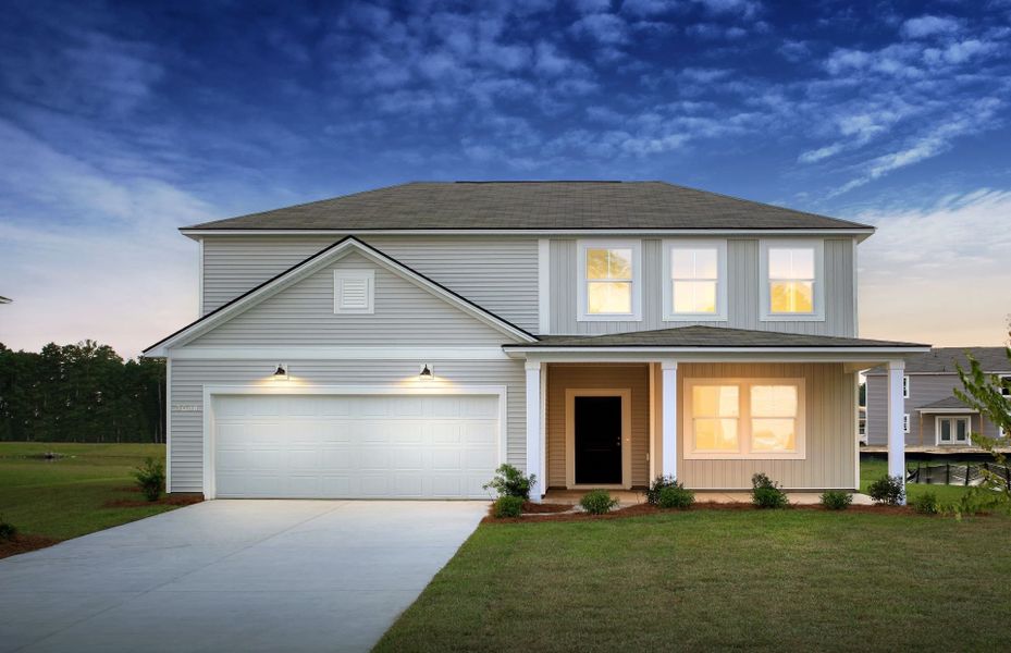 Rosella New Home Exterior TD103 at Twilight with a covered front porch.