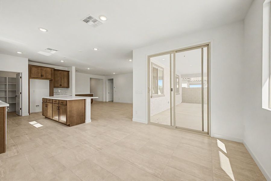 Spacious, unfurnished interior of a new home in The Villages at North Copper Canyon, Surprise (Image 8).