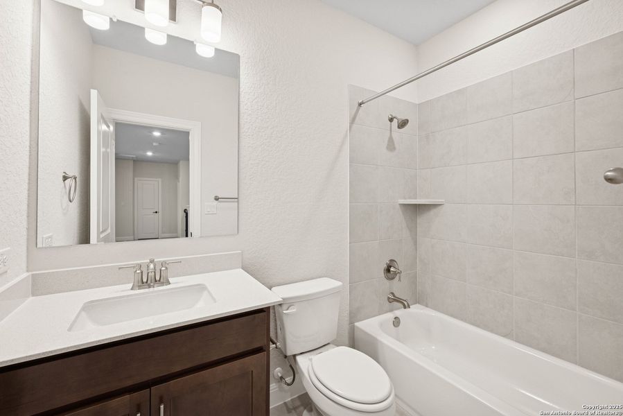 Furnished interior view inside a new home in Windsong - Reserve Series, Boerne (Image 14). Furnished interior view inside a new home in Windsong - Reserve Series, Boerne (Image 14).