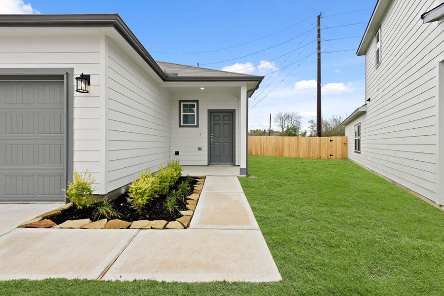 Exterior details and patio area of a home in Barrett Crossing, Crosby (Image 3).