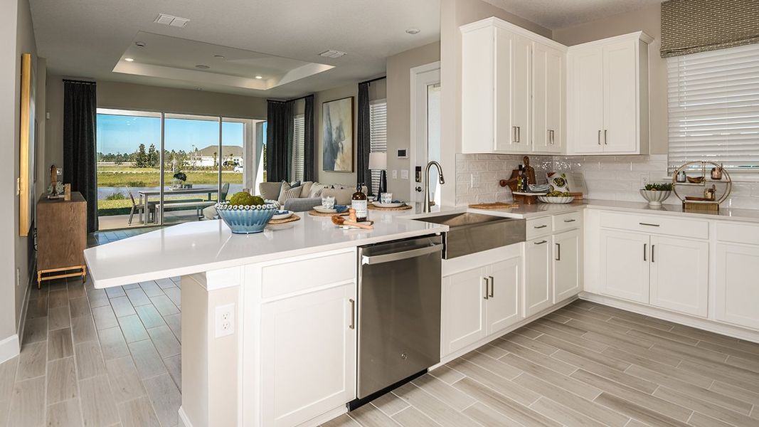 Furnished interior view inside a new home in Esplanade at Kingston, Estero (Image 12).