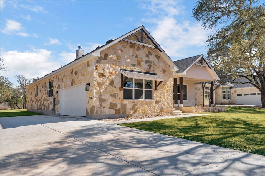 Front exterior of a new home in , Burnet, TX, highlighting curb appeal (Image 1). Front exterior of a new home in , Burnet, TX, highlighting curb appeal (Image 1).
