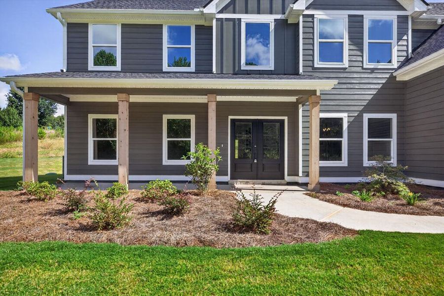 Exterior details and patio area of a home in Blackwelder Bluff, Bowdon (Image 3).