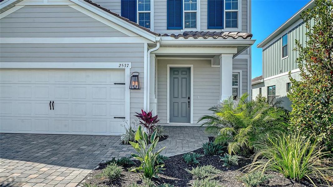 Exterior details and patio area of a home in Windward, Sarasota (Image 17).