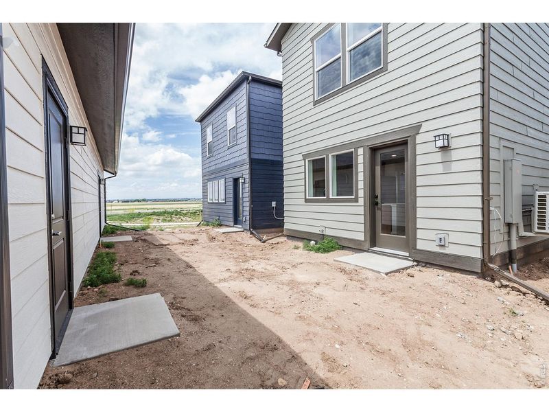 Exterior details and patio area of a home in Prairie Song Story Collection - Single Family Homes, Windsor (Image 27).