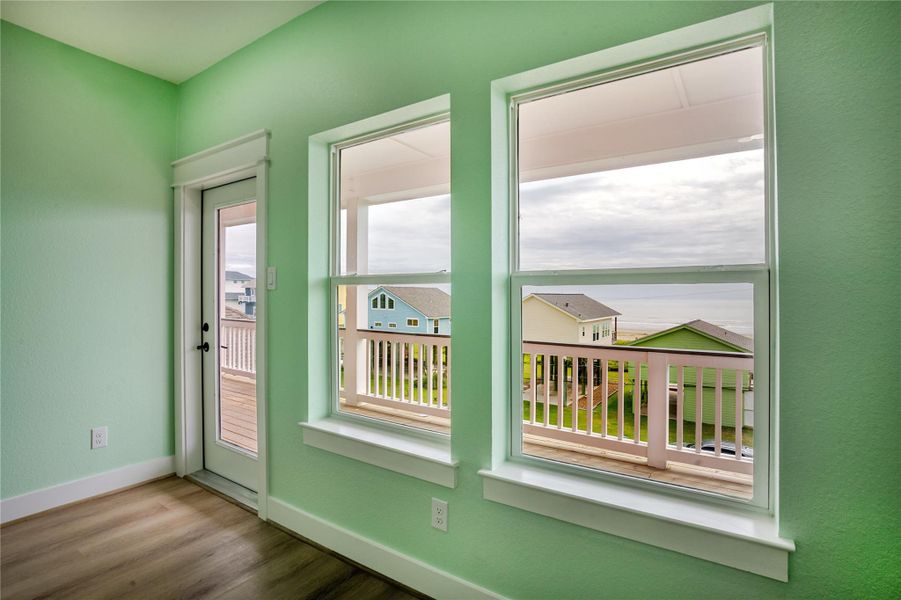 Step outside this bedroom and you are practically sitting on the beach!