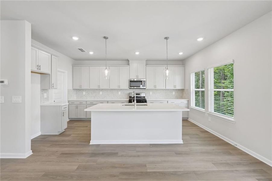 Furnished interior view inside a new home in Martin Springs - Estate Series, Lawrenceville (Image 9).