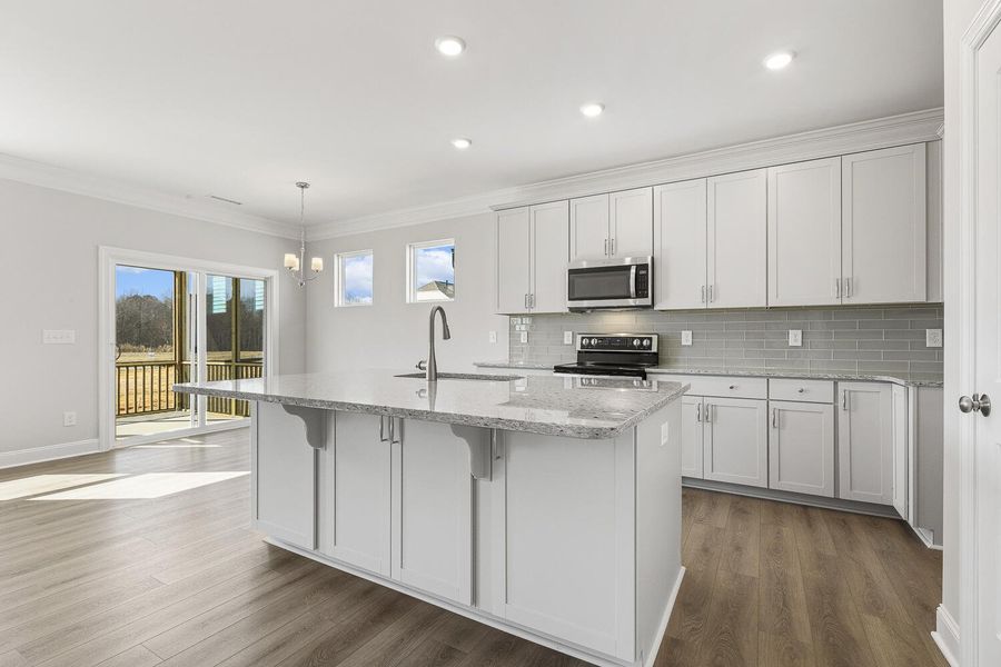 Furnished interior view inside a new home in 1158 Place, Wilson (Image 15).