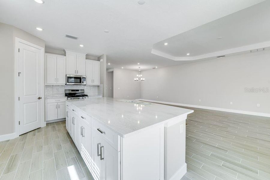 Furnished interior view inside a new home in Esplanade at Skye Ranch, Sarasota (Image 5).