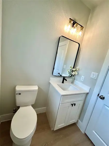 Half bathroom downstairs Half bathroom downstairs