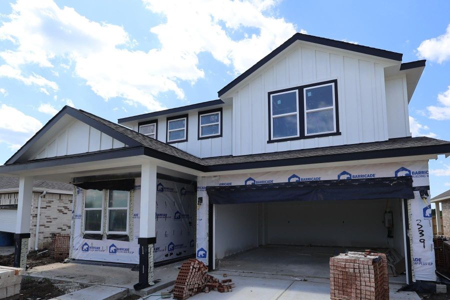 Two story home with 5 beds, 3 baths, and 2 car garage