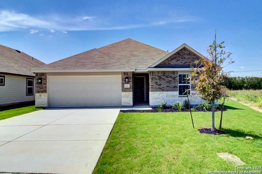 Front exterior of a new home in Cloud Country, New Braunfels, TX, highlighting curb appeal (Image 1).