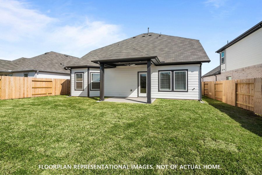 Exterior details and patio area of a home in Pinewood at Grand Texas, New Caney (Image 3).
