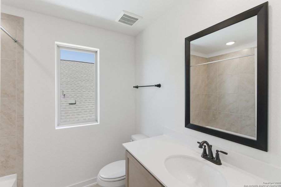 Furnished interior view inside a new home in The Crossvine – Garden Homes, Schertz (Image 4).