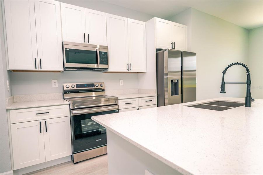 Furnished interior view inside a new home in , Kissimmee (Image 6).