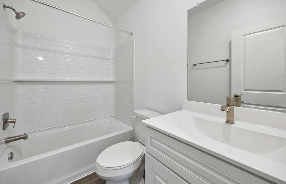 Furnished interior view inside a new home in Ellerden, Tomball (Image 34).