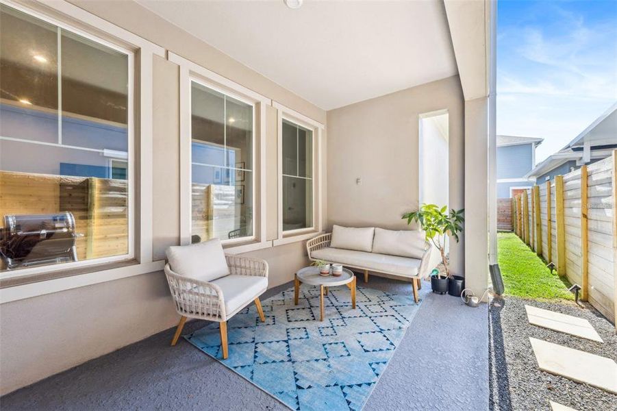 Exterior details and patio area of a home in Laureate Park at Lake Nona - Garden Series, Orlando (Image 4).