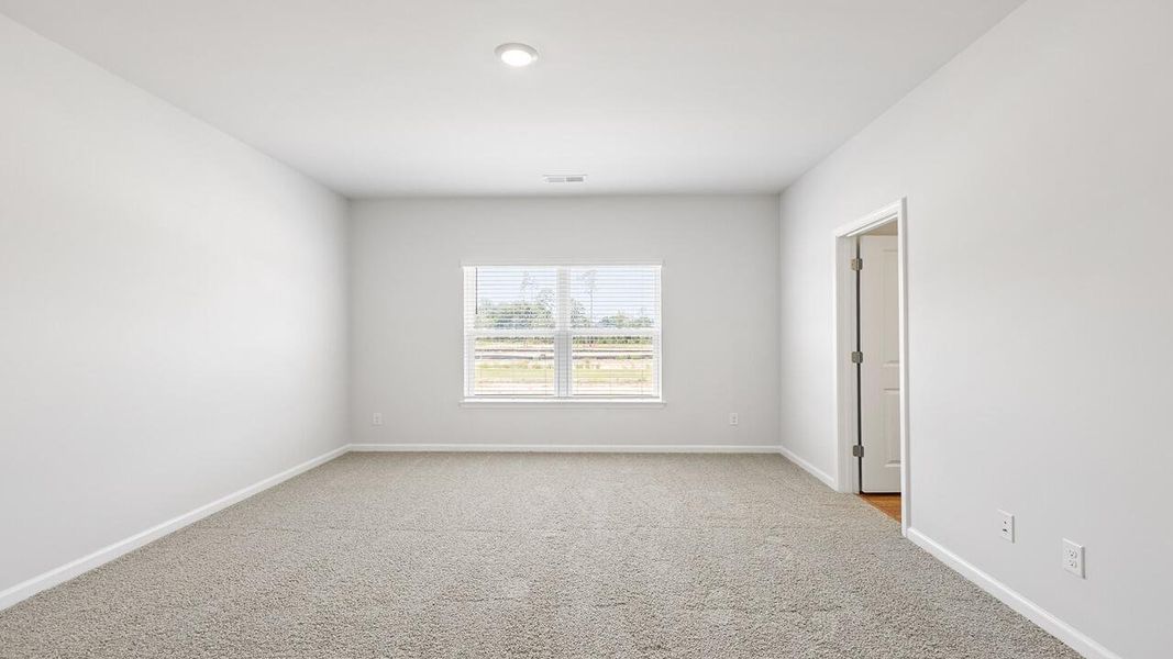 Spacious, unfurnished interior of a new home in The Crossing at St. James, Summerville (Image 24).