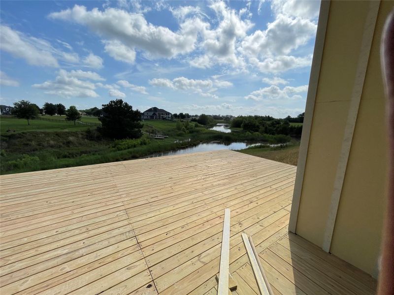 View of deck out of the primary bedroom! View of deck out of the primary bedroom!
