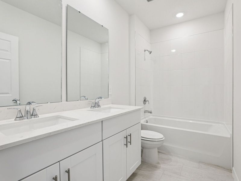 Furnished interior view inside a new home in Lake Deer Estates - Signature Series, Poinciana (Image 7).