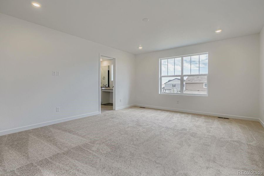 Spacious, unfurnished interior of a new home in Sky Ranch: Pioneer Collection, Watkins (Image 12).