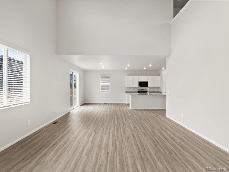 Spacious, unfurnished interior of a new home in Buffalo Highlands: The Flora Collection, Commerce City (Image 15).