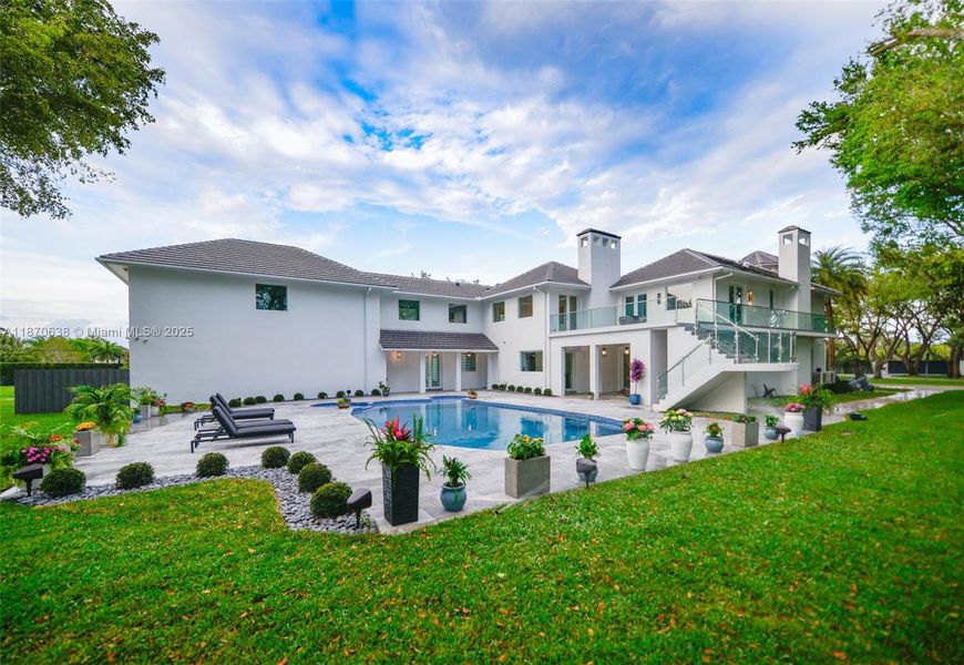 Front exterior of a new home in , Palmetto Bay, FL, highlighting curb appeal (Image 22).