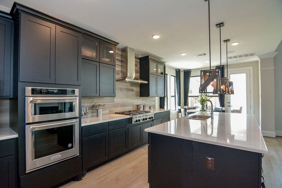 Furnished interior view inside a new home in Bridgeland, Cypress (Image 7).