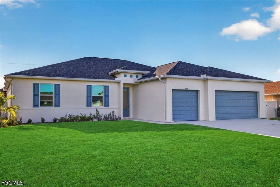 Front exterior of a new home in Cape Coral, Cape Coral, FL, highlighting curb appeal (Image 1). Front exterior of a new home in Cape Coral, Cape Coral, FL, highlighting curb appeal (Image 1).