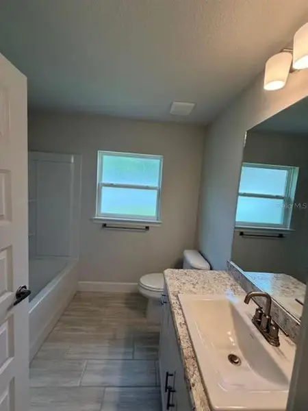 Furnished interior view inside a new home in St. James Park, Ocala (Image 4).