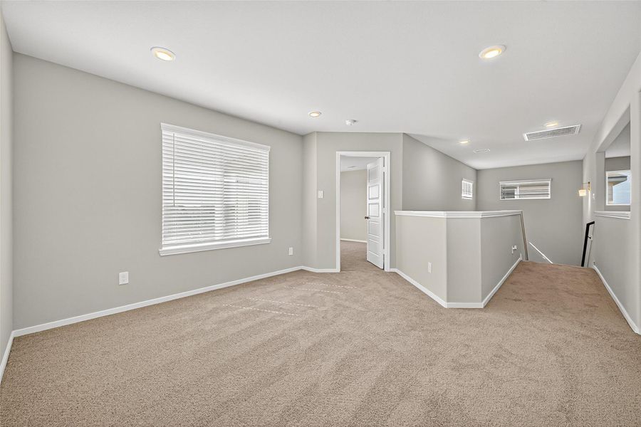 Spacious, unfurnished interior of a new home in Sunterra, Katy (Image 39).