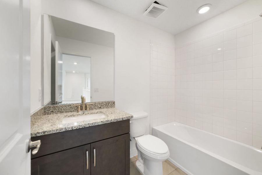 Furnished interior view inside a new home in Vintner Reserve, Clermont (Image 13).