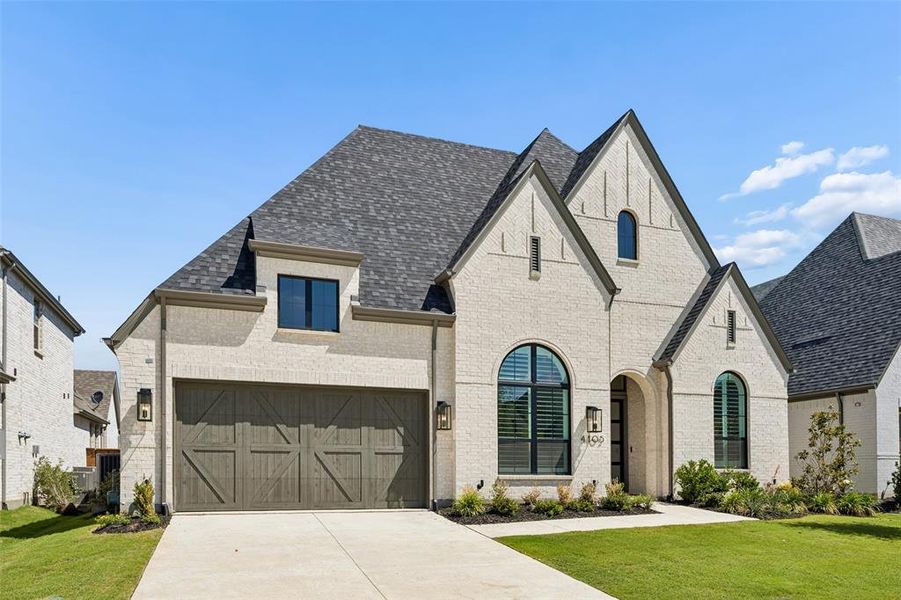 Front exterior of a new home in Mosaic, Celina, TX, highlighting curb appeal (Image 2).