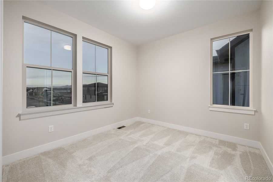 Spacious, unfurnished interior of a new home in West Grange, Longmont (Image 21).