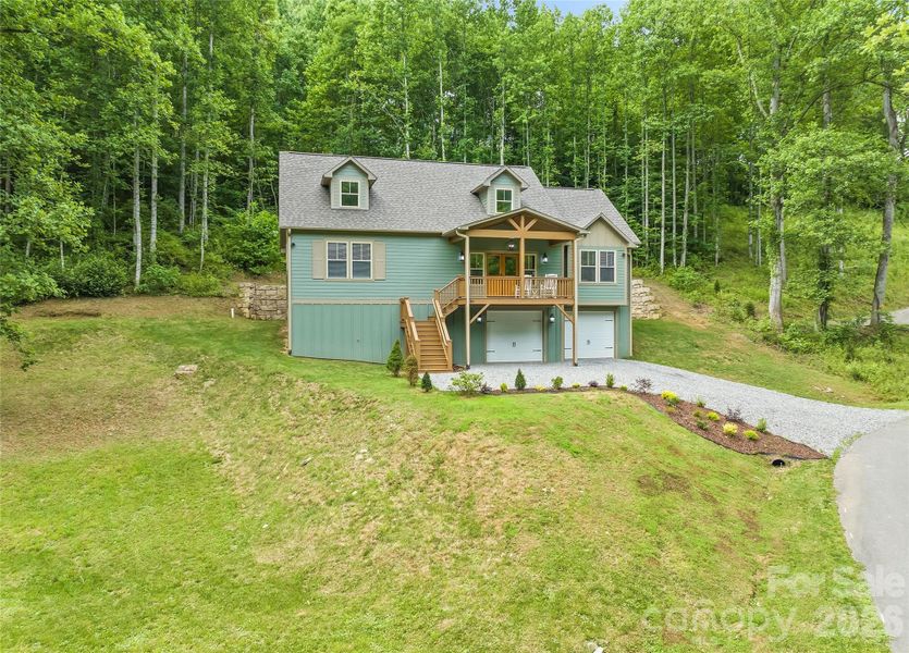 Exterior details and patio area of a home in , Waynesville (Image 27).