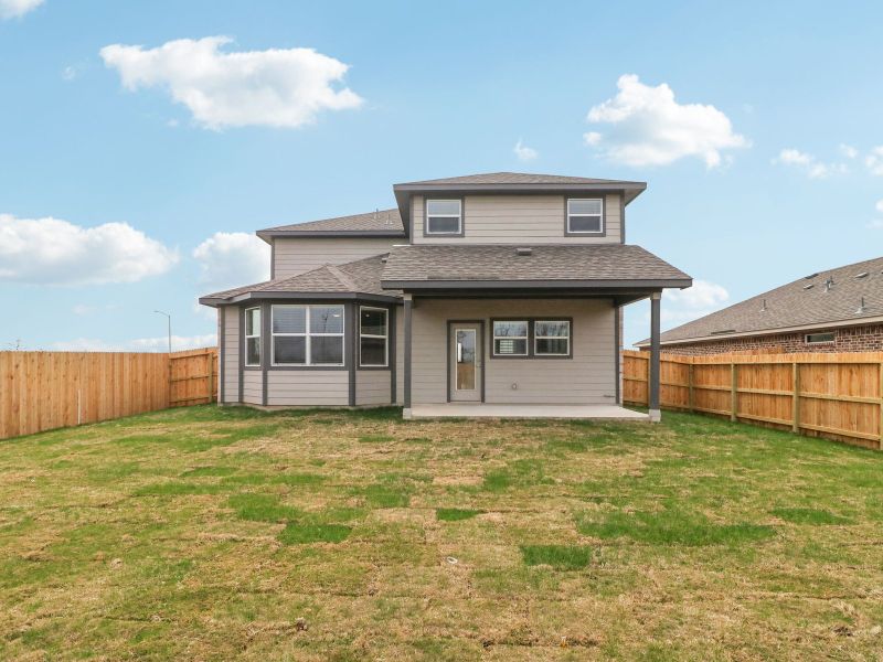 Back exterior of the Medina floorplan at a Meritage Homes community. Back exterior of the Medina floorplan at a Meritage Homes community.