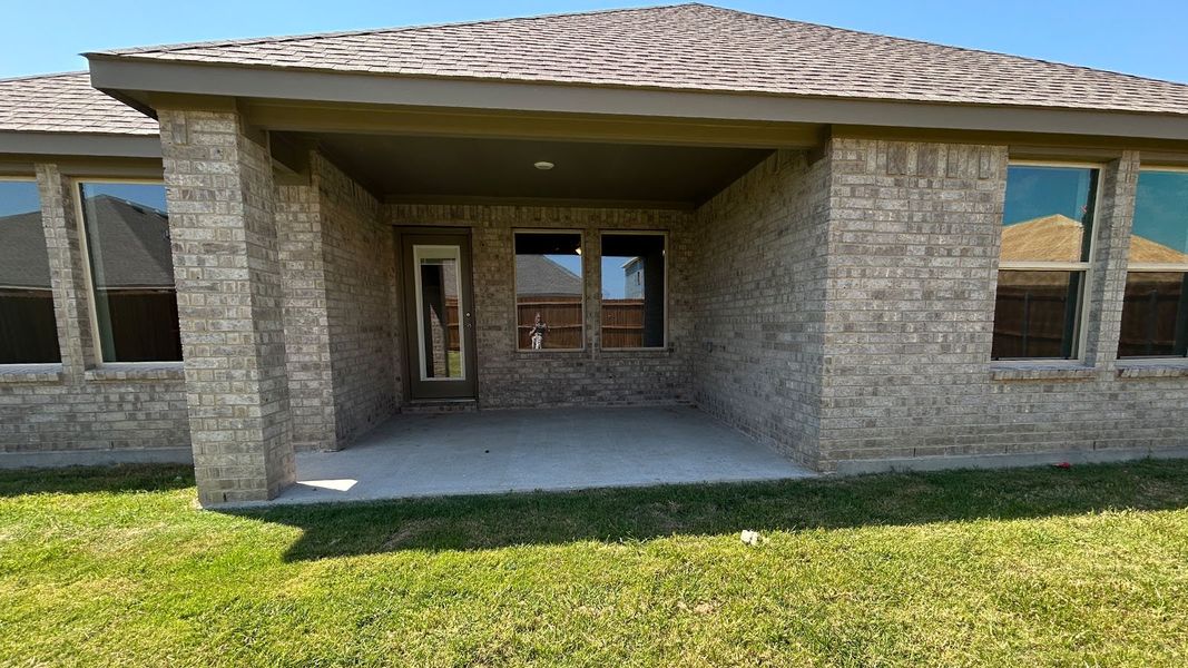 Exterior details and patio area of a home in Trailstone, Caddo Mills (Image 2).